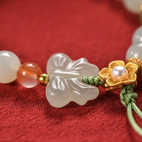 Natural Hetian Jade Hand String (flowers are silver, other metals are alloy)