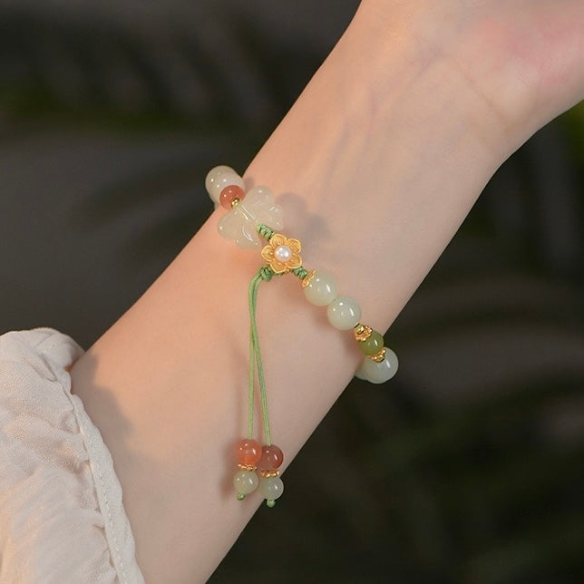 Natural Hetian Jade Hand String (flowers are silver, other metals are alloy)