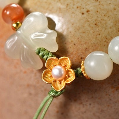 Natural Hetian Jade Hand String (flowers are silver, other metals are alloy)