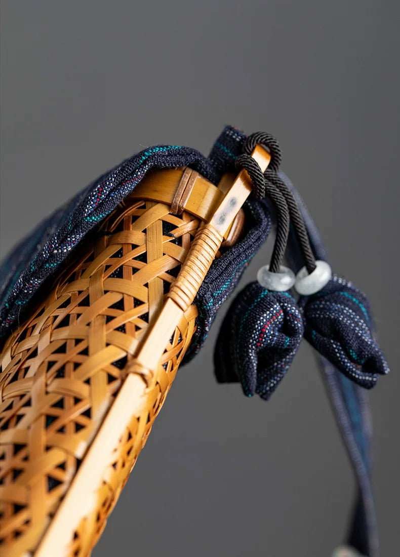 Exquisitely handcrafted lacquer weaving with a bamboo woven storage bag
