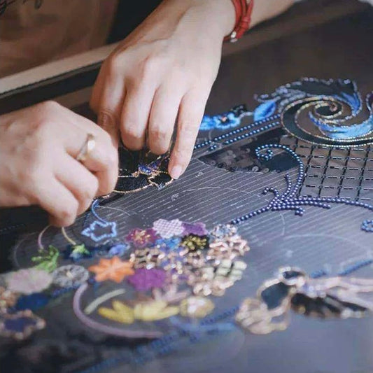 Hand-embroidered decorative ornament